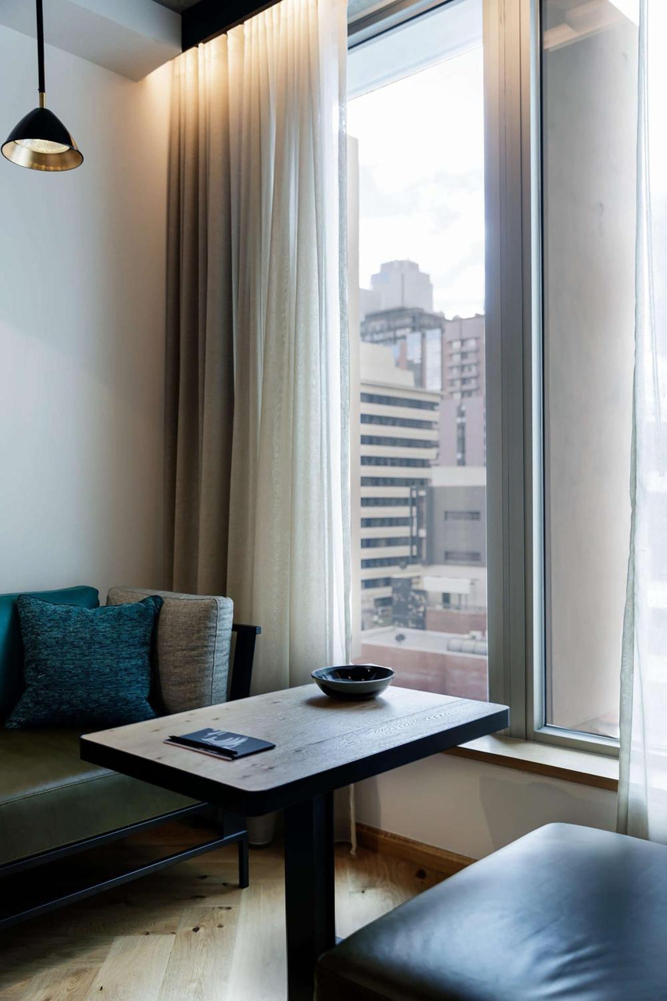 فندق كيو تي ملبورن المظهر الخارجي الصورة A room at the hotel